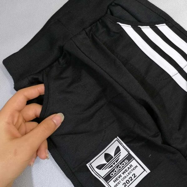 شلوار سه خط مشکی سفید پسرانه