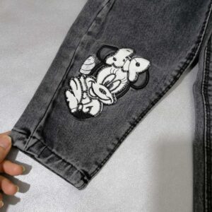 شلوار لی دخترانه مشکی طرح میکی موس مناسب 1 تا 12 سال