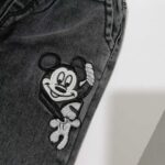 شلوار لی دخترانه مشکی طرح میکی موس مناسب 1 تا 12 سال