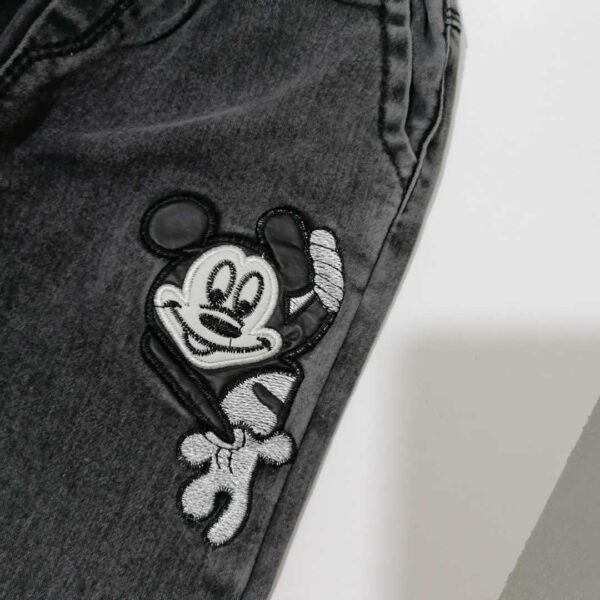 شلوار لی دخترانه مشکی طرح میکی موس مناسب 1 تا 12 سال