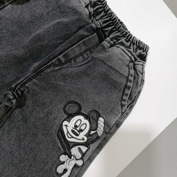 شلوار لی دخترانه مشکی طرح میکی موس مناسب 1 تا 12 سال
