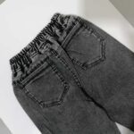 شلوار لی دخترانه مشکی طرح میکی موس مناسب 1 تا 12 سال