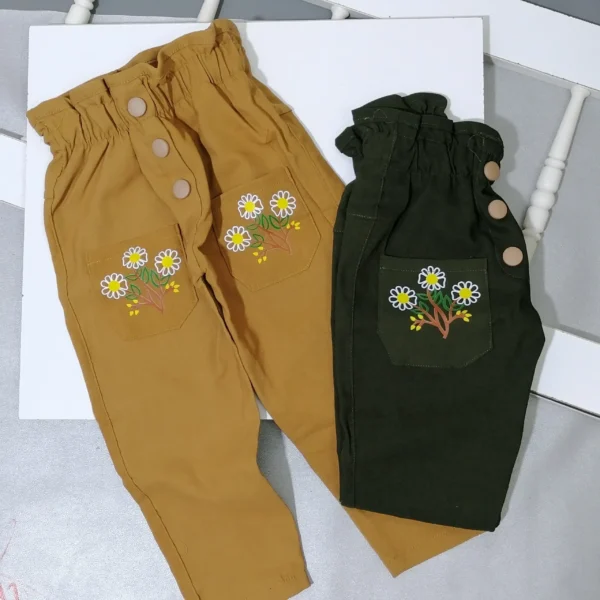 شلوار کتان دو جیب گلدار دخترانه