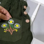 شلوار کتان دو جیب گلدار دخترانه