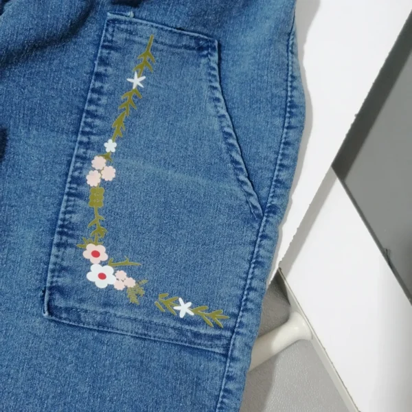 شلوار مام فیت دخترانه گل نقاشی | 5 تا 12 سال - Image 3